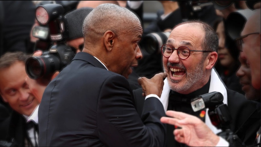 Capa: Fotógrafo irrita Denzel Washington em festival e é advertido: “Pare!”